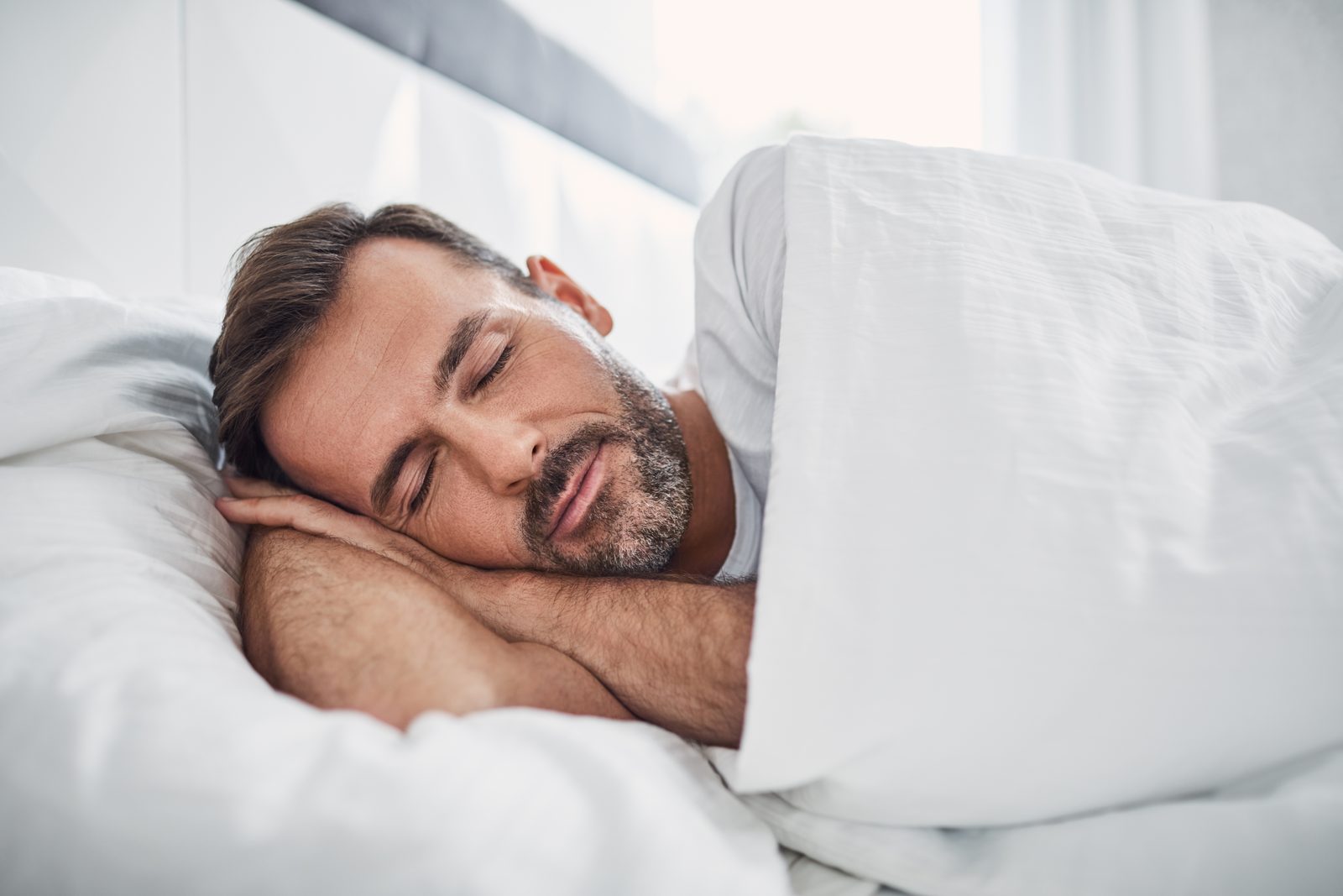 Man sleeping soundly through the night